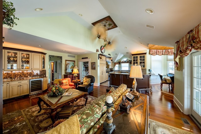 2404 Atlantic Ave, Longport, NJ 08403 - living room featuring beverage cooler, lofted ceiling, bar, dark wood-style floors, and healthy amount of natural light