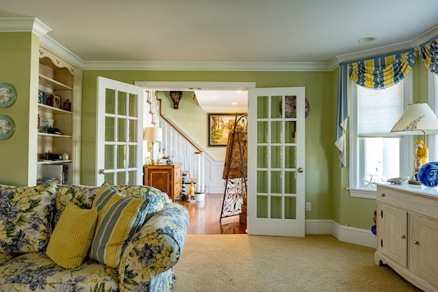 2404 Atlantic Ave, Longport, NJ 08403 - living room with french doors, ornamental molding, and stairway