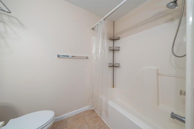 227 E Leaming Ave Unit A, Wildwood, NJ 08260 - bathroom with tile patterned floors, toilet, shower / tub combo with curtain, and baseboards