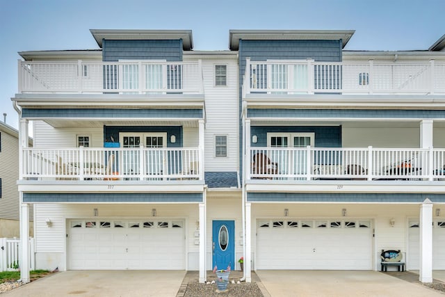 227 E Leaming Ave Unit A, Wildwood, NJ 08260 - view of property featuring a balcony, an attached garage, and concrete driveway