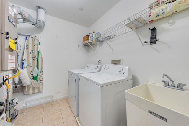 227 E Leaming Ave Unit A, Wildwood, NJ 08260 - washroom with washer and dryer, light tile patterned floors, and baseboards