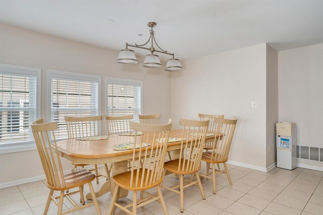 227 E Leaming Ave Unit A, Wildwood, NJ 08260 - dining space featuring plenty of natural light, baseboards, and light tile patterned flooring