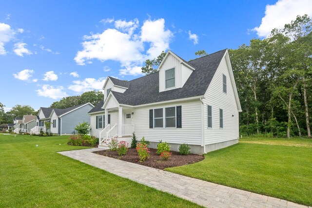 70 W Rising Sun Dr, Ocean View, NJ 08230 - view of front facade featuring a front yard and a shingled roof