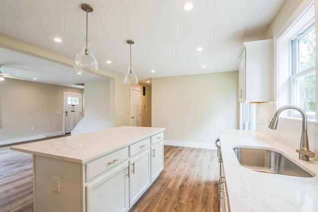 70 W Rising Sun Dr, Ocean View, NJ 08230 - kitchen featuring plenty of natural light, recessed lighting, a center island, and white cabinetry