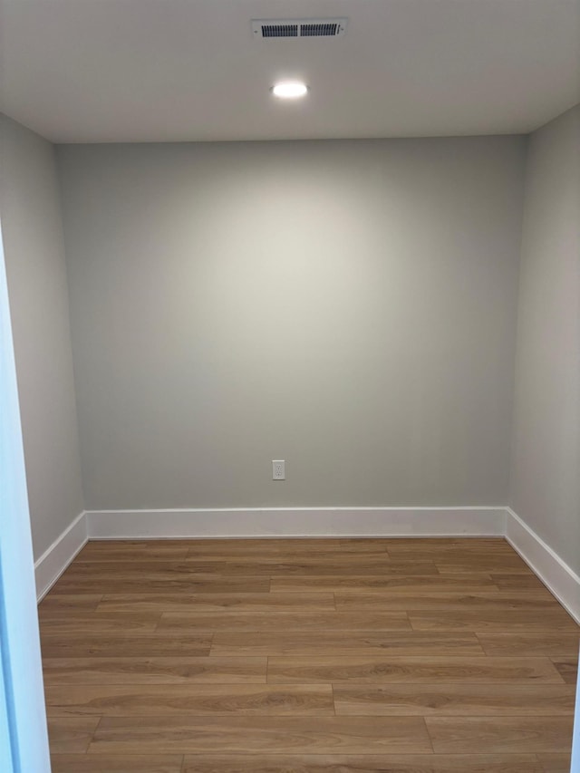 unfurnished room featuring light wood-type flooring