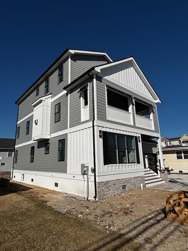 view of home's exterior with a yard