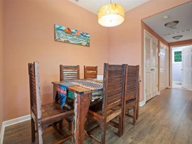 dining room with hardwood / wood-style floors