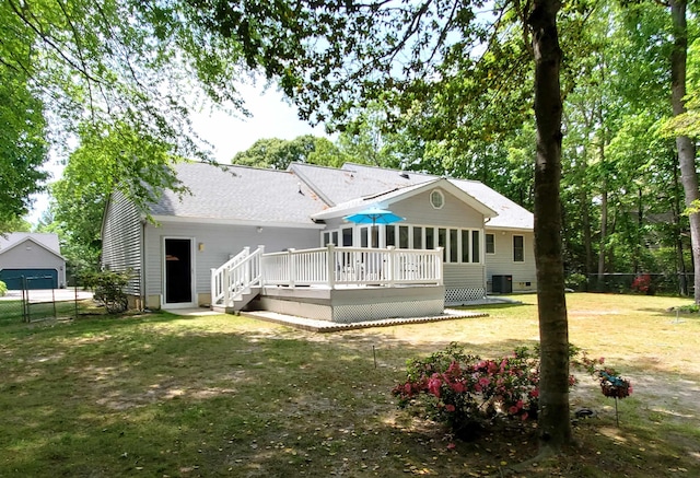 20 Summer Cir, North Cape May, NJ 08204 - back of property with a deck, cooling unit, and a shingled roof