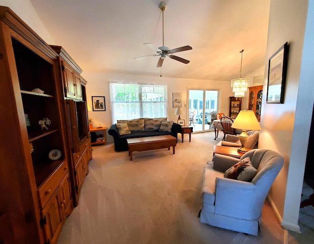 20 Summer Cir, North Cape May, NJ 08204 - living room with light colored carpet, a ceiling fan, vaulted ceiling, and a chandelier