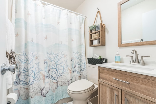 full bath featuring toilet and vanity