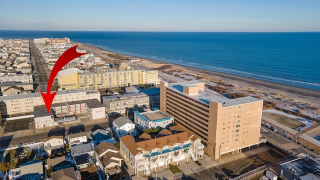 aerial view with a beach view and a water view