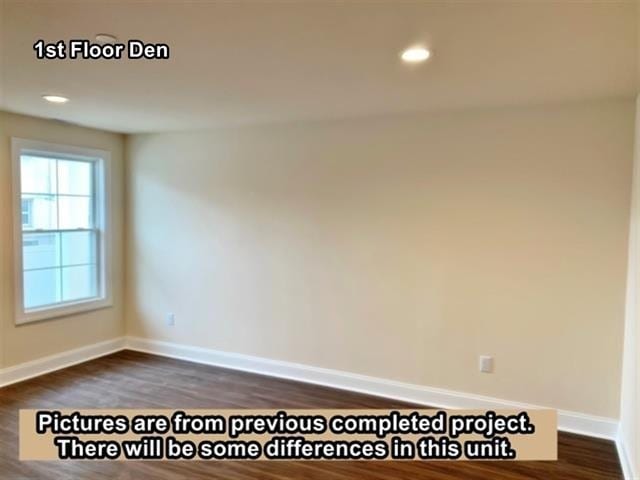 empty room with dark wood-type flooring