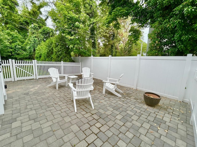 847 Broadway Unit 8, West Cape May, NJ 08204 - view of patio / terrace featuring a fire pit