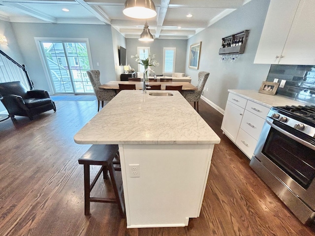 847 Broadway Unit 8, West Cape May, NJ 08204 - kitchen with a sink, stainless steel gas range, dark wood-type flooring, coffered ceiling, and beamed ceiling