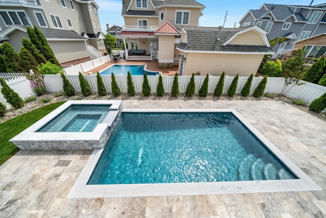 286 75th St, Avalon, NJ 08202 - view of swimming pool with a patio area, a fenced backyard, and a pool with connected hot tub