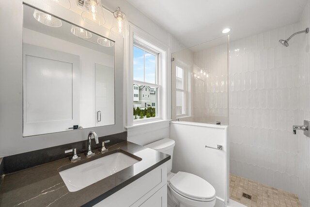 286 75th St, Avalon, NJ 08202 - full bath with a tile shower, toilet, vanity, and recessed lighting