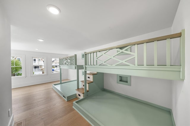 286 75th St, Avalon, NJ 08202 - unfurnished bedroom with wood finished floors, baseboards, and recessed lighting