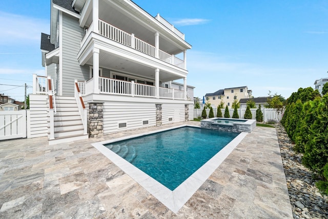 286 75th St, Avalon, NJ 08202 - view of swimming pool with stairs, a fenced backyard, a patio, and a pool with connected hot tub