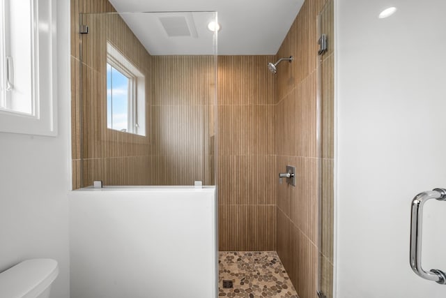 286 75th St, Avalon, NJ 08202 - bathroom featuring a tile shower and toilet