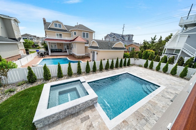 286 75th St, Avalon, NJ 08202 - view of swimming pool with an outdoor living space, a fenced backyard, a pool with connected hot tub, and a patio