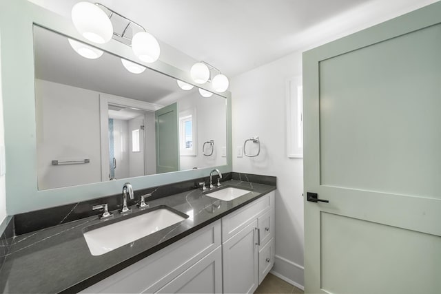 286 75th St, Avalon, NJ 08202 - full bathroom featuring double vanity and baseboards