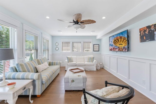 149 10th St, Avalon, NJ 08202 - living room featuring a wainscoted wall, a ceiling fan, light wood-style flooring, recessed lighting, and a decorative wall