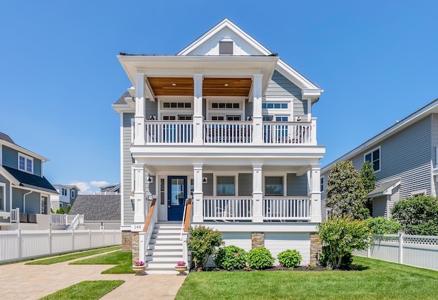 149 10th St, Avalon, NJ 08202 - view of front facade with a balcony and a porch