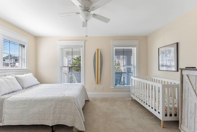 149 10th St, Avalon, NJ 08202 - bedroom with multiple windows, carpet flooring, and ceiling fan
