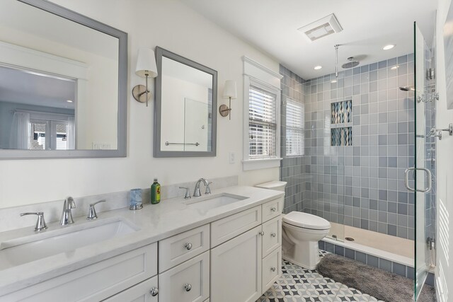 149 10th St, Avalon, NJ 08202 - full bath featuring a stall shower, double vanity, and tile patterned floors