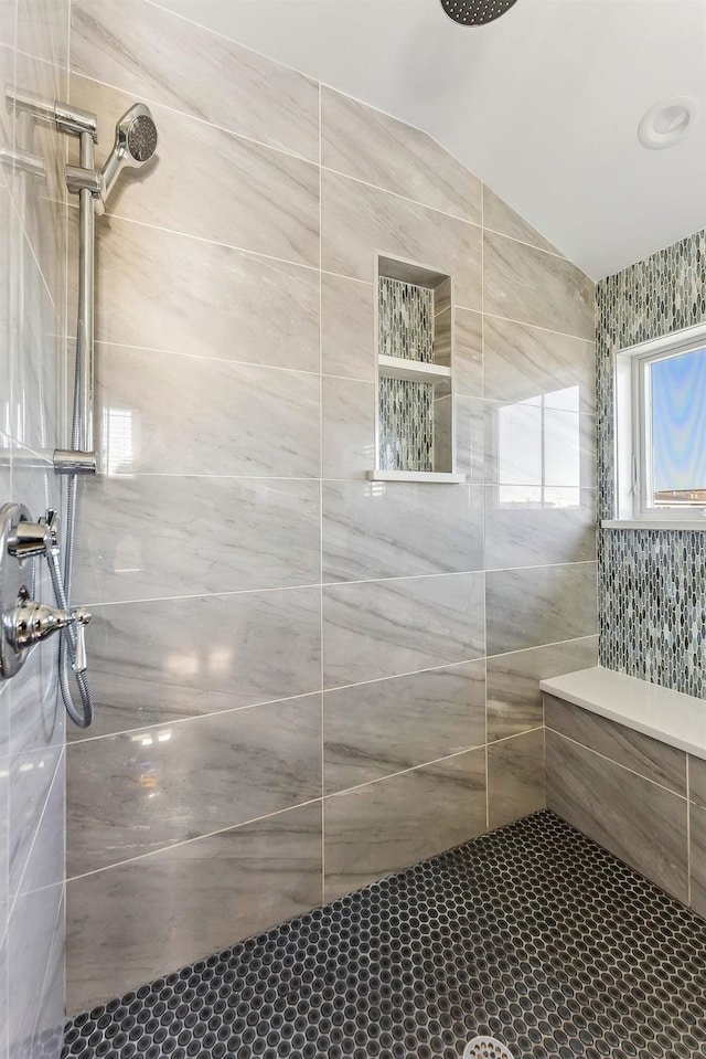149 10th St, Avalon, NJ 08202 - bathroom with a tile shower and lofted ceiling