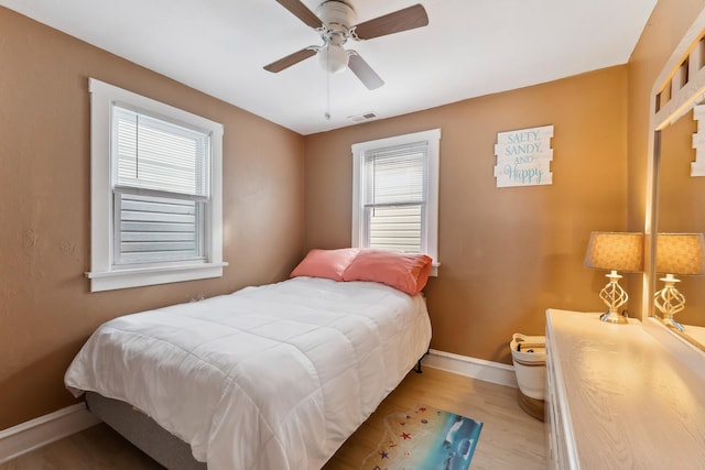 221 W 25th Ave, North Wildwood, NJ 08260 - bedroom with light wood-style flooring and a ceiling fan