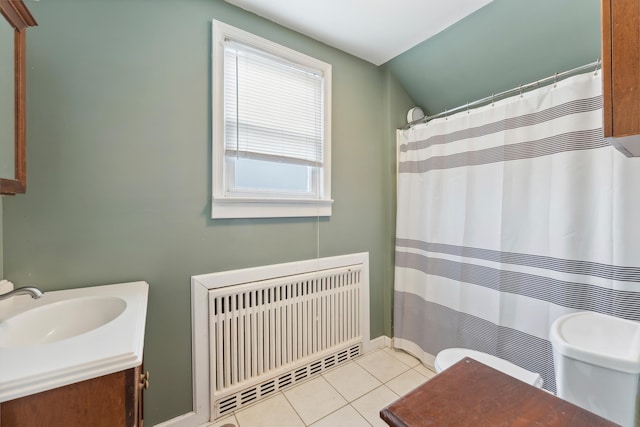 221 W 25th Ave, North Wildwood, NJ 08260 - full bathroom with radiator heating unit, vanity, tile patterned floors, vaulted ceiling, and curtained shower