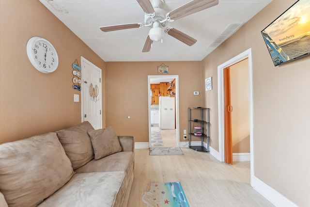 221 W 25th Ave, North Wildwood, NJ 08260 - living area featuring light wood finished floors and ceiling fan