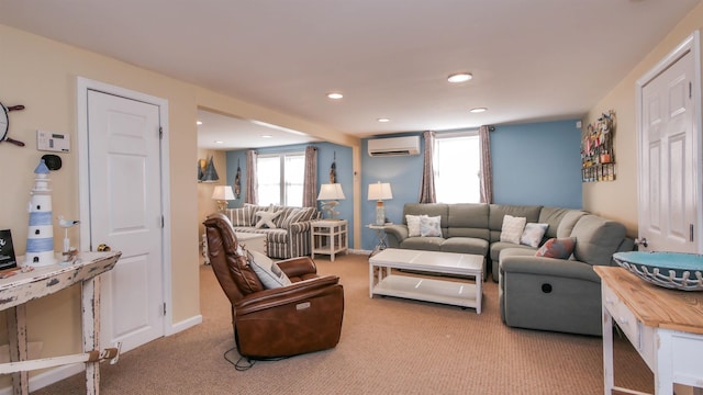 living area with carpet flooring, recessed lighting, an AC wall unit, and baseboards
