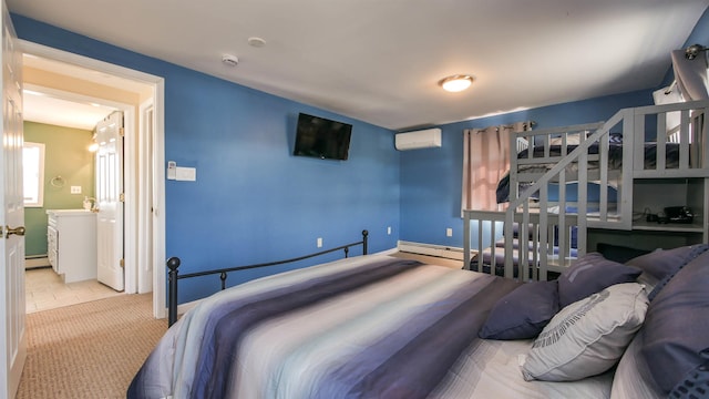 bedroom featuring a wall unit AC, carpet floors, and a baseboard radiator