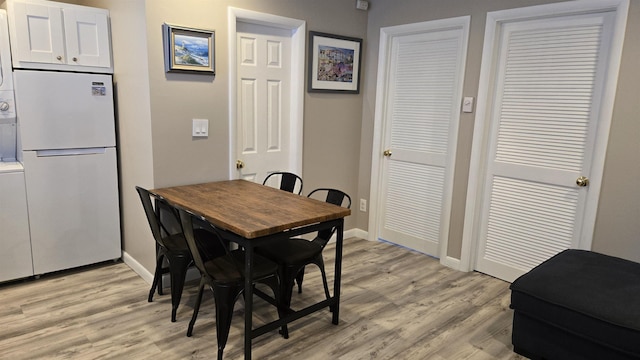 dining area featuring light hardwood / wood-style floors