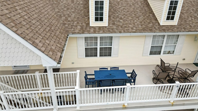 3102 Ocean Ave Unit G, Wildwood, NJ 08260 - rear view of property featuring roof with shingles and outdoor dining area
