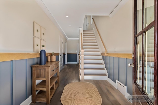 foyer with recessed lighting, stairway, crown molding, and wood finished floors