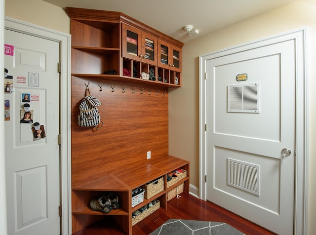 mudroom with dark hardwood / wood-style floors