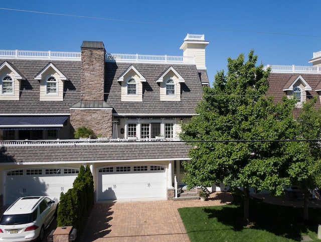 view of front of house with a garage