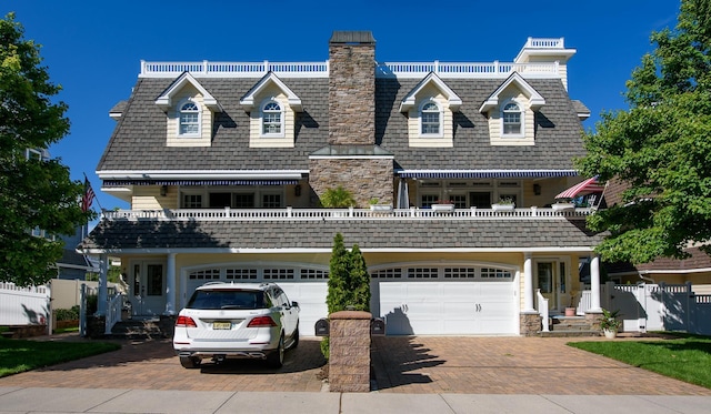 view of front of property with a garage