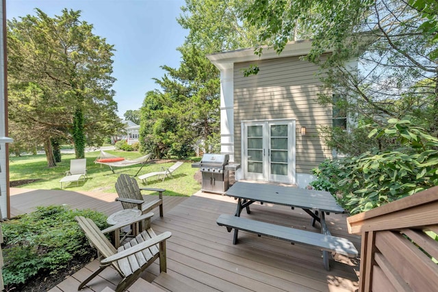 312 S Lake Dr, Cape May Point, NJ 08212 - wooden terrace featuring a lawn and grilling area