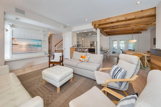 312 S Lake Dr, Cape May Point, NJ 08212 - living area featuring wood finished floors, stairway, recessed lighting, and beamed ceiling