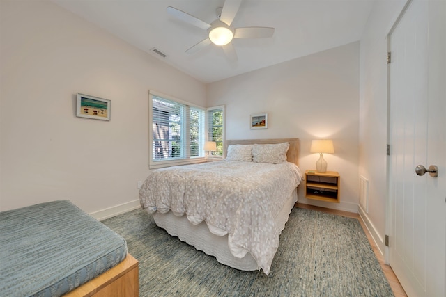 312 S Lake Dr, Cape May Point, NJ 08212 - bedroom with ceiling fan and wood finished floors