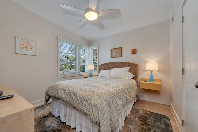 312 S Lake Dr, Cape May Point, NJ 08212 - bedroom with wood finished floors and ceiling fan