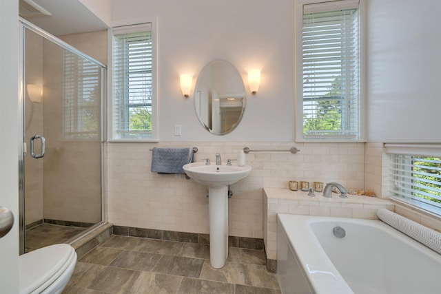 312 S Lake Dr, Cape May Point, NJ 08212 - bathroom with tile walls, a garden tub, and a shower stall