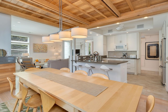 312 S Lake Dr, Cape May Point, NJ 08212 - dining area with a wood ceiling with exposed beams