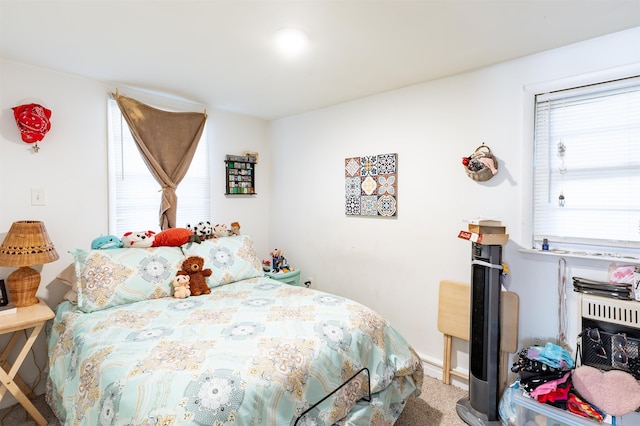 bedroom featuring carpet