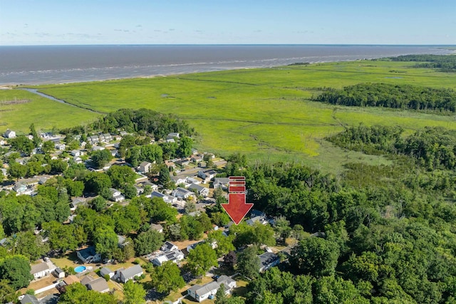 bird's eye view with a rural view and a water view