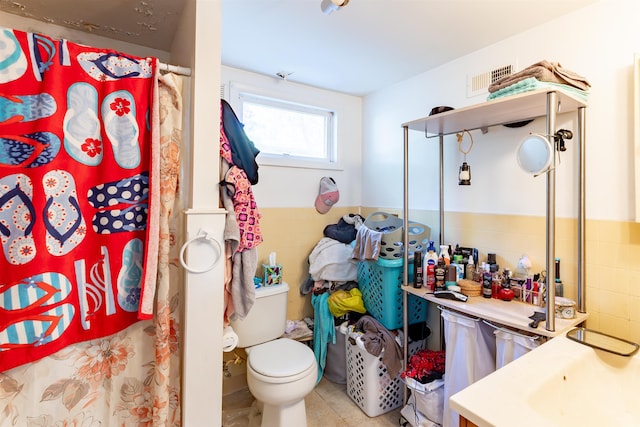 bathroom featuring toilet